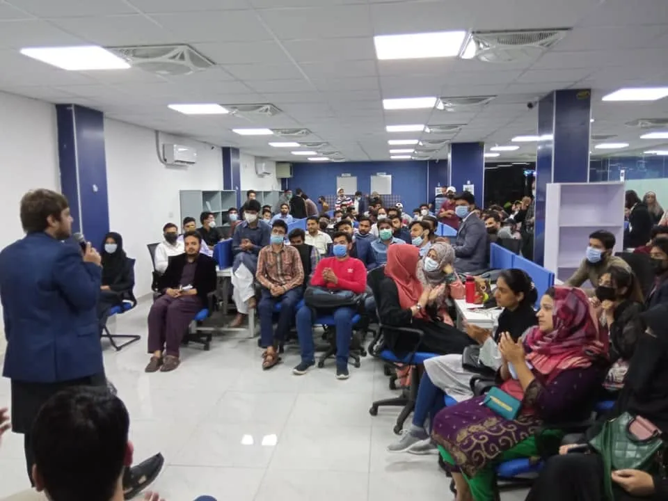 Attendees at the Extreme Commerce Lahore General Meetup listening to the speaker