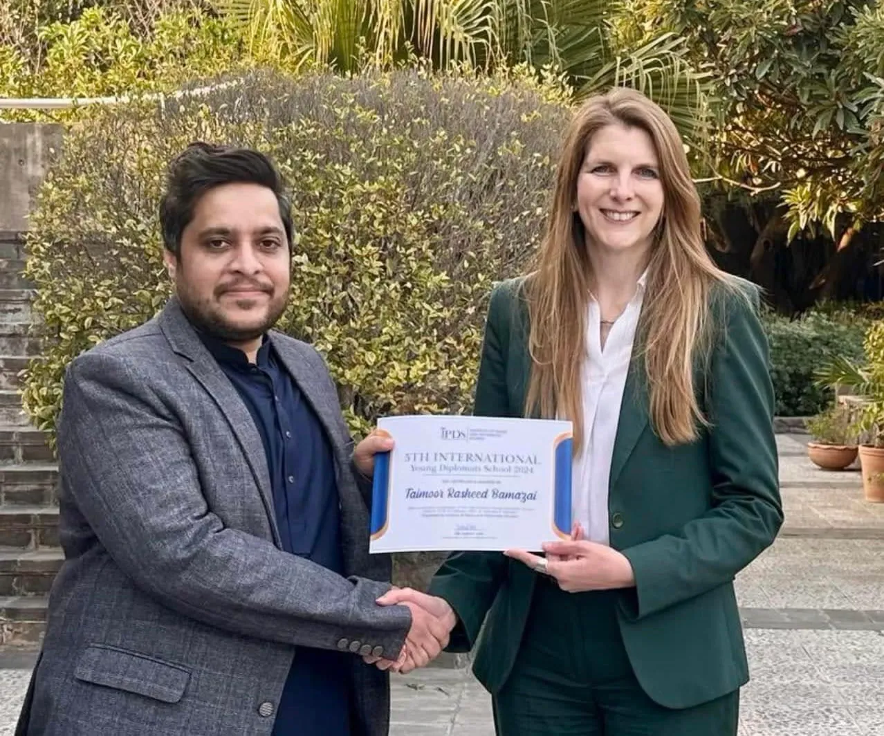 Taimoor Bamazai receiving a certificate at the British High Commission in Islamabad