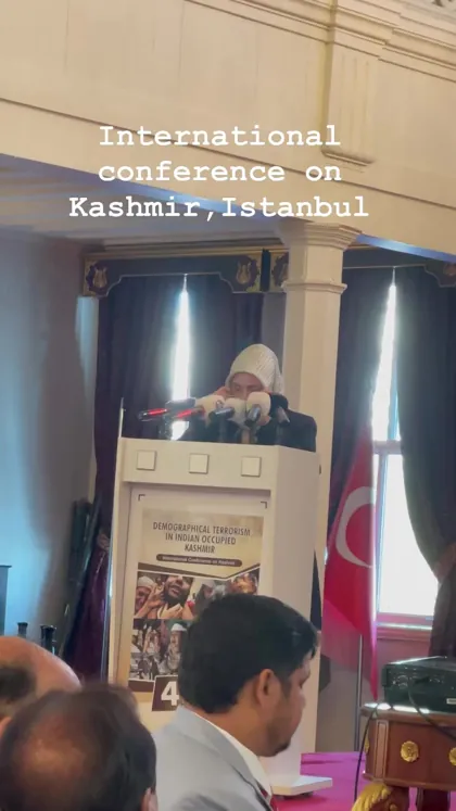 Speaker at a podium during the International Conference on Kashmir in Istanbul